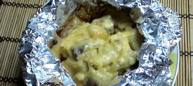 Говядина в фольге с овощами