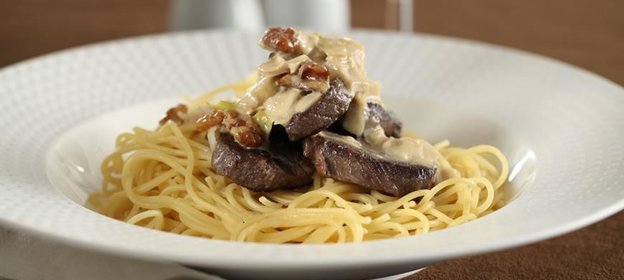 Говядина в сливочном соусе