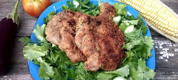 Свиная отбивная на зеленой подушке