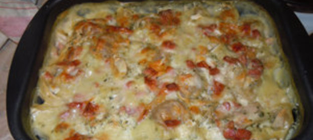 Пельмени по-Уральски(запечнные в сметане с ветчиной)