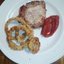 Pork steak and onion rings Свиной стейк и луковые кольца