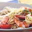 Спагетти с креветками, помидорами и соусом песто