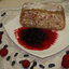 Блинная запеканка с творогом и клубникой с соусом из жимолости