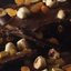 Черный шоколад с орехами и курагой