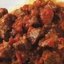 Рагу из говядины с помидорами, чесноком и красным вином