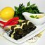 Виноградные листья фаршированные бараниной и булгуром под мятным соусом