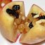 Запеченные яблоки с медом, изюмом и кедровыми орешками