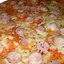 Пицца с сосиской и сыром