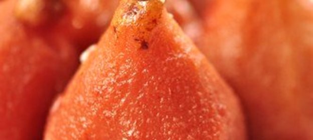 Груши с клюквой в медовом сиропе со специями