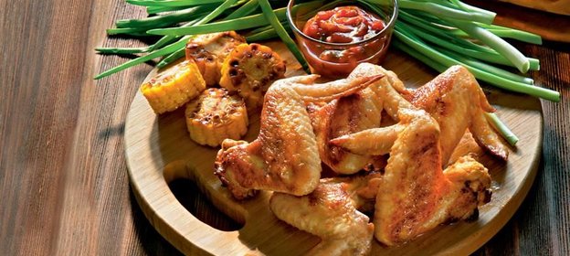 Крылышки, маринованные в остром маринаде и обжаренные на гриле