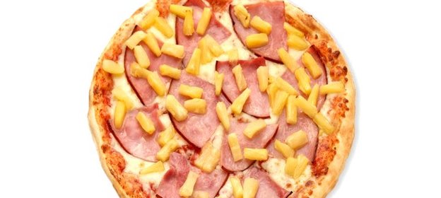 Пицца с ананасами и ветчиной