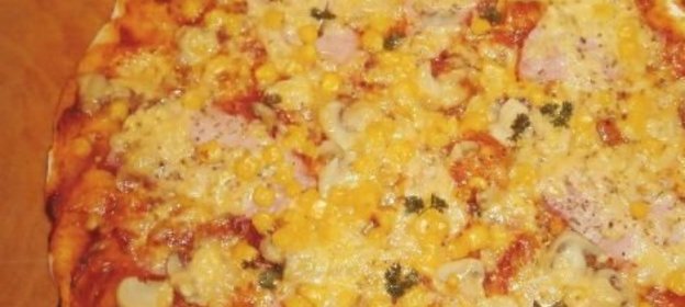 Пицца с ветчиной и грибами