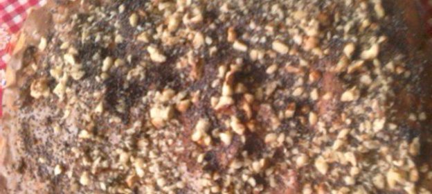 Морской окунь с бананами под сырно-винным соусом